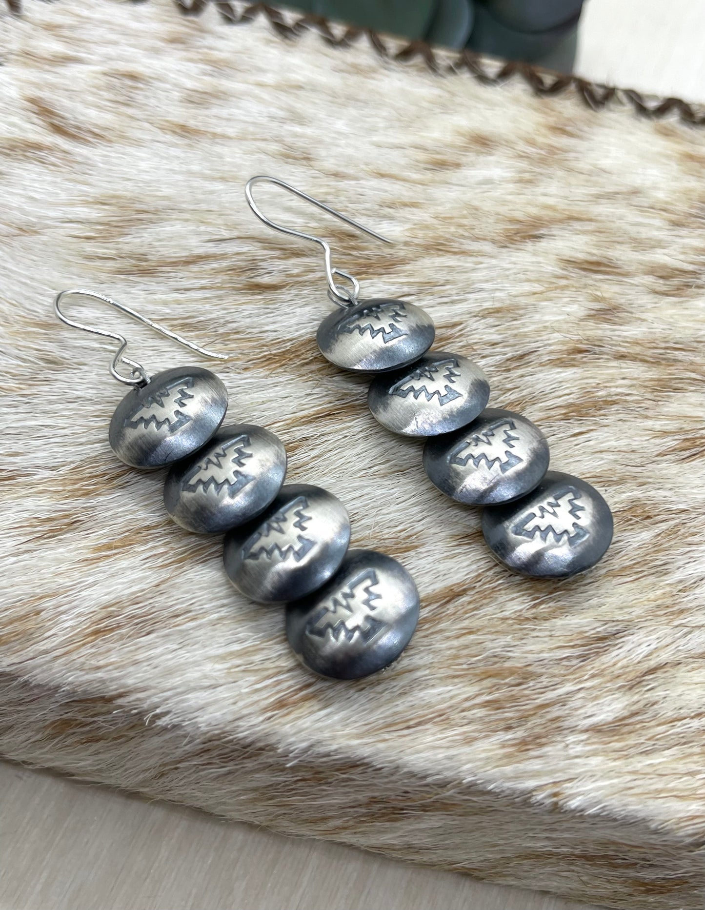 Stamped Pillowbead Dangle Earrings by Maryetta Daukei Kellywood, Navajo