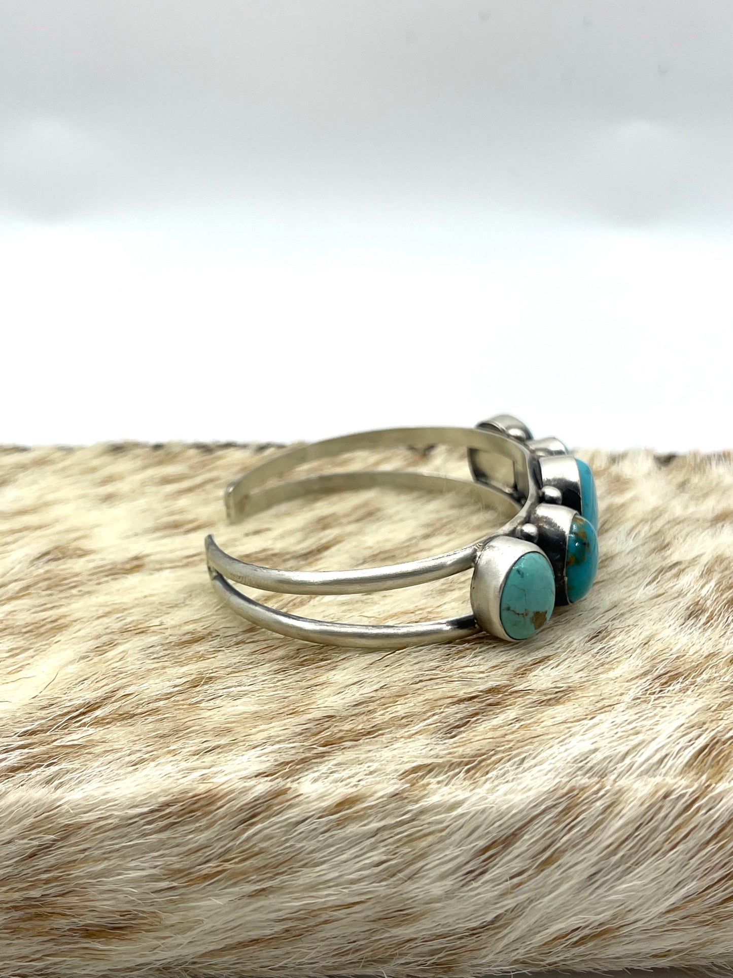 5.5”-7 5 Stone Turquoise Cuff by Augustine Largo, Navajo