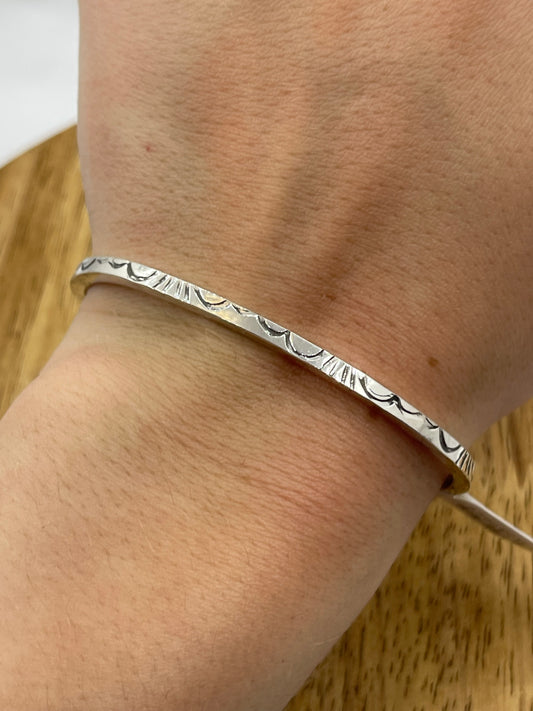 5 1/2"-7" Square Wire Stamped Cuff by Elaine Tahe, Navajo