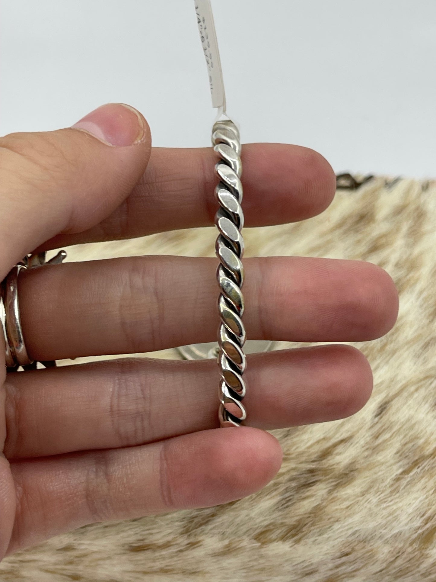 5 1/4"-6 1/2" Silver Twisted Cuff by Elaine Tahe, Navajo