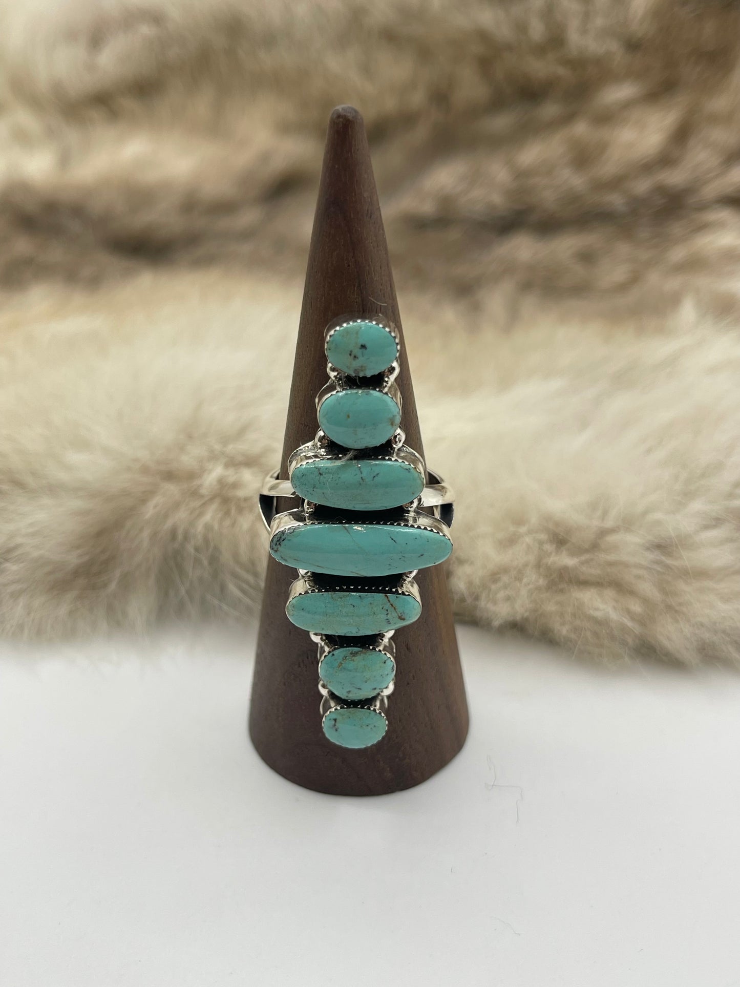 10.0 7 Stone Turquoise Ring by Loretta Delgarito, Navajo