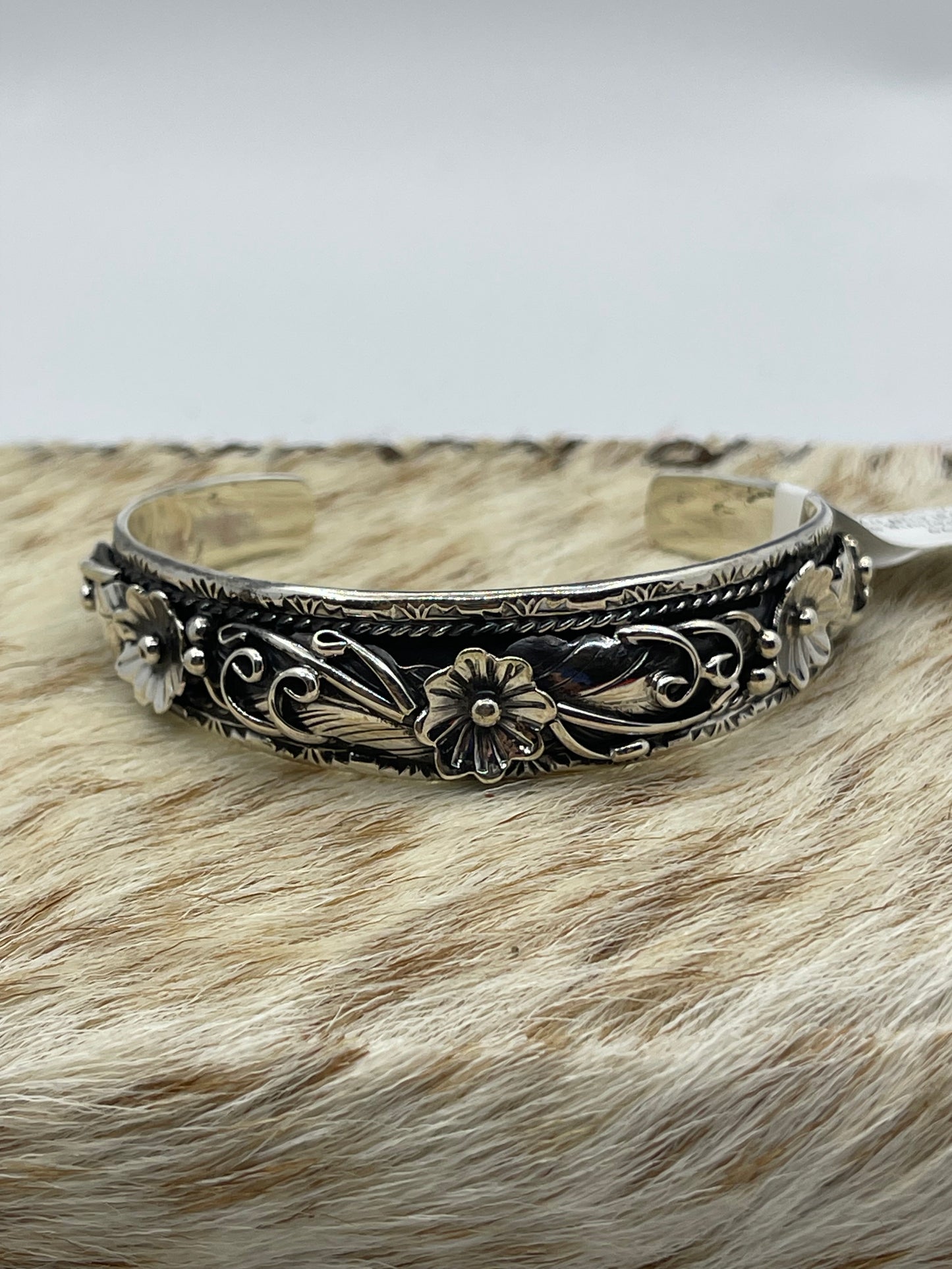 5 3/4"-7" Sterling Silver Floral Cuff by Bessie Joe, Navajo