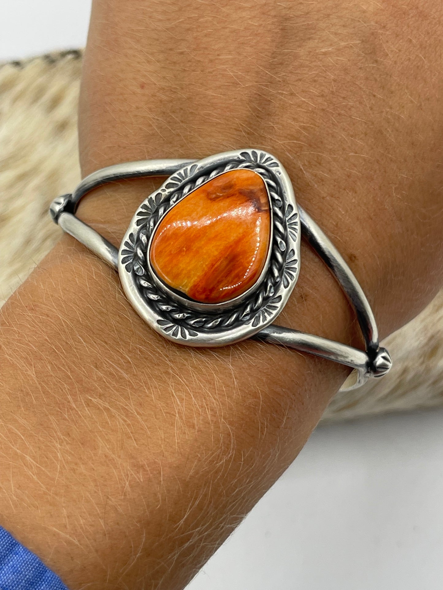 7 3/4"-7 1/4" Teardrop Orange Spiny Oyster Shell Cuff by Augustine Largo, Navajo