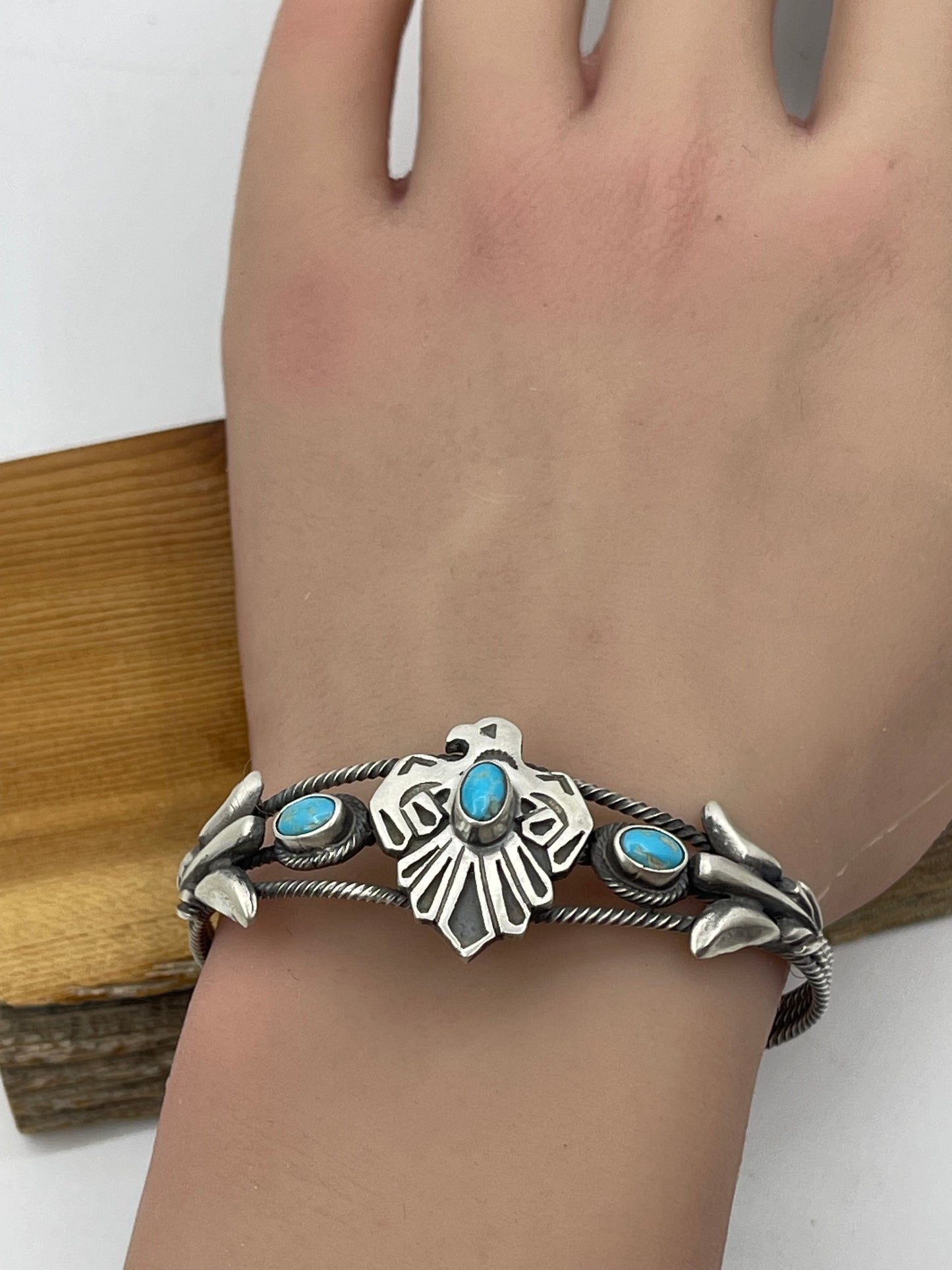5 1/2"-7 1/2" Turquoise Thunderbird Cuff by Bobby Platero, Navajo