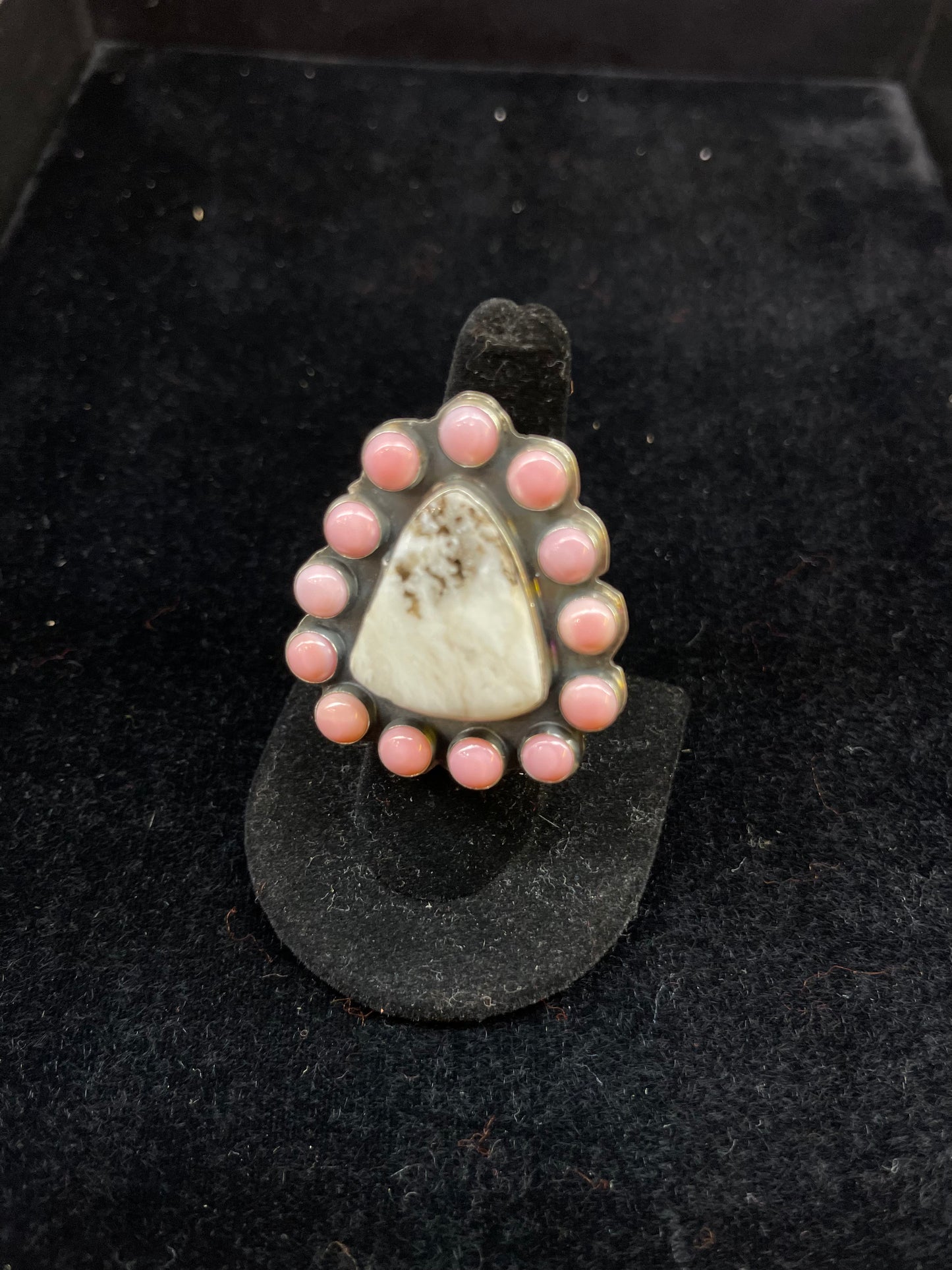 White Buffalo With Pink Conch Shell Rings