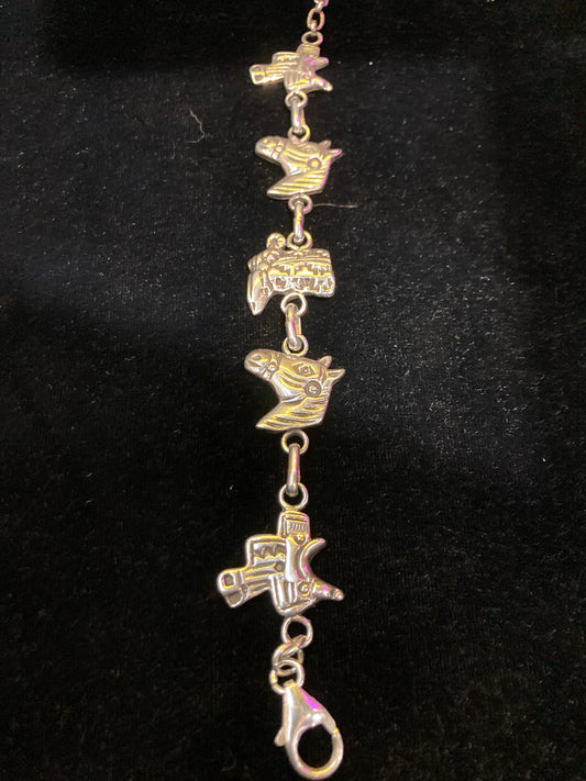 Horse And Saddle Charm Bracelet by Russell Sam, Navajo