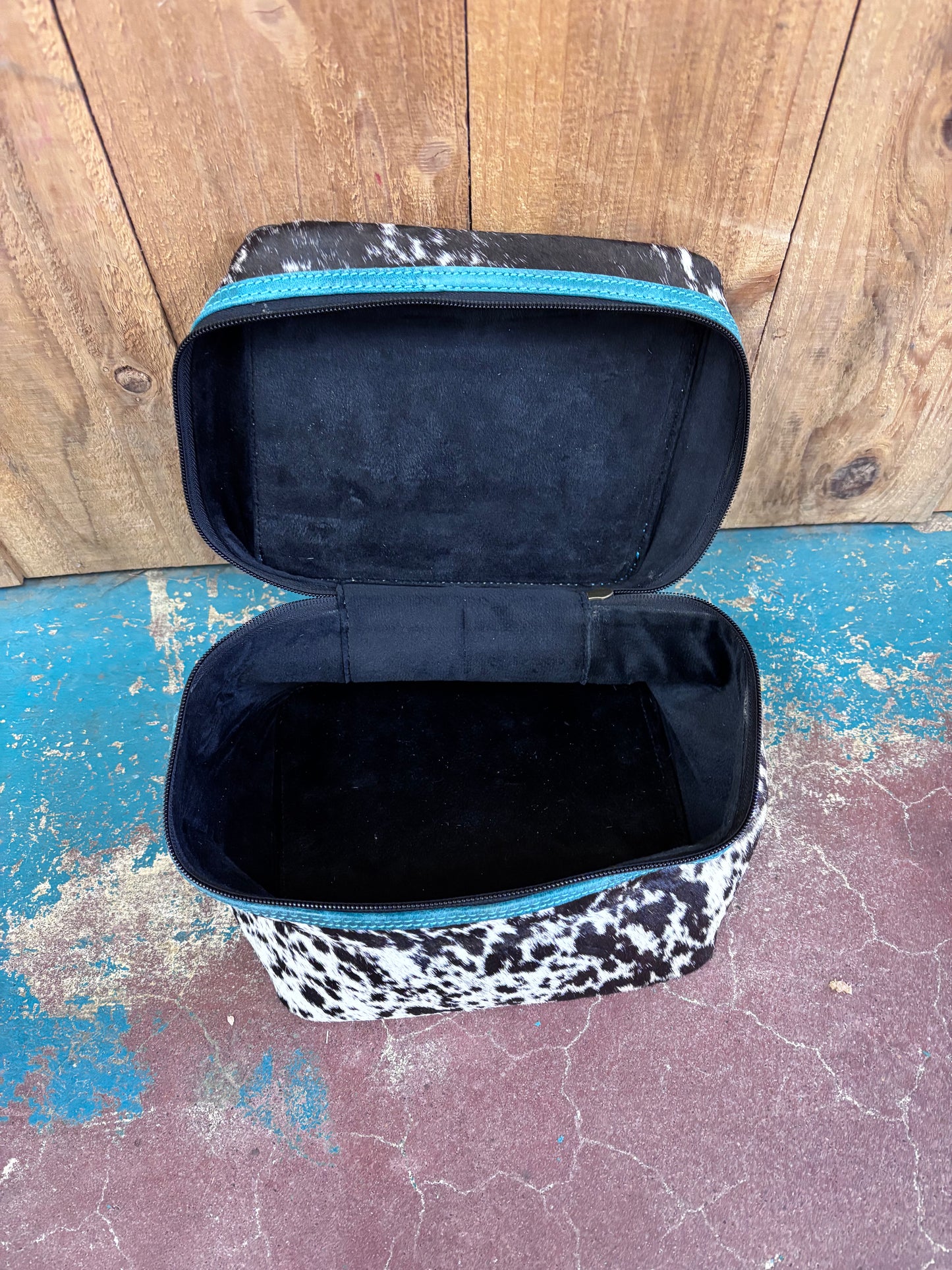 Turquoise Tooled Black And White Cowhide Leather Make Up Bag