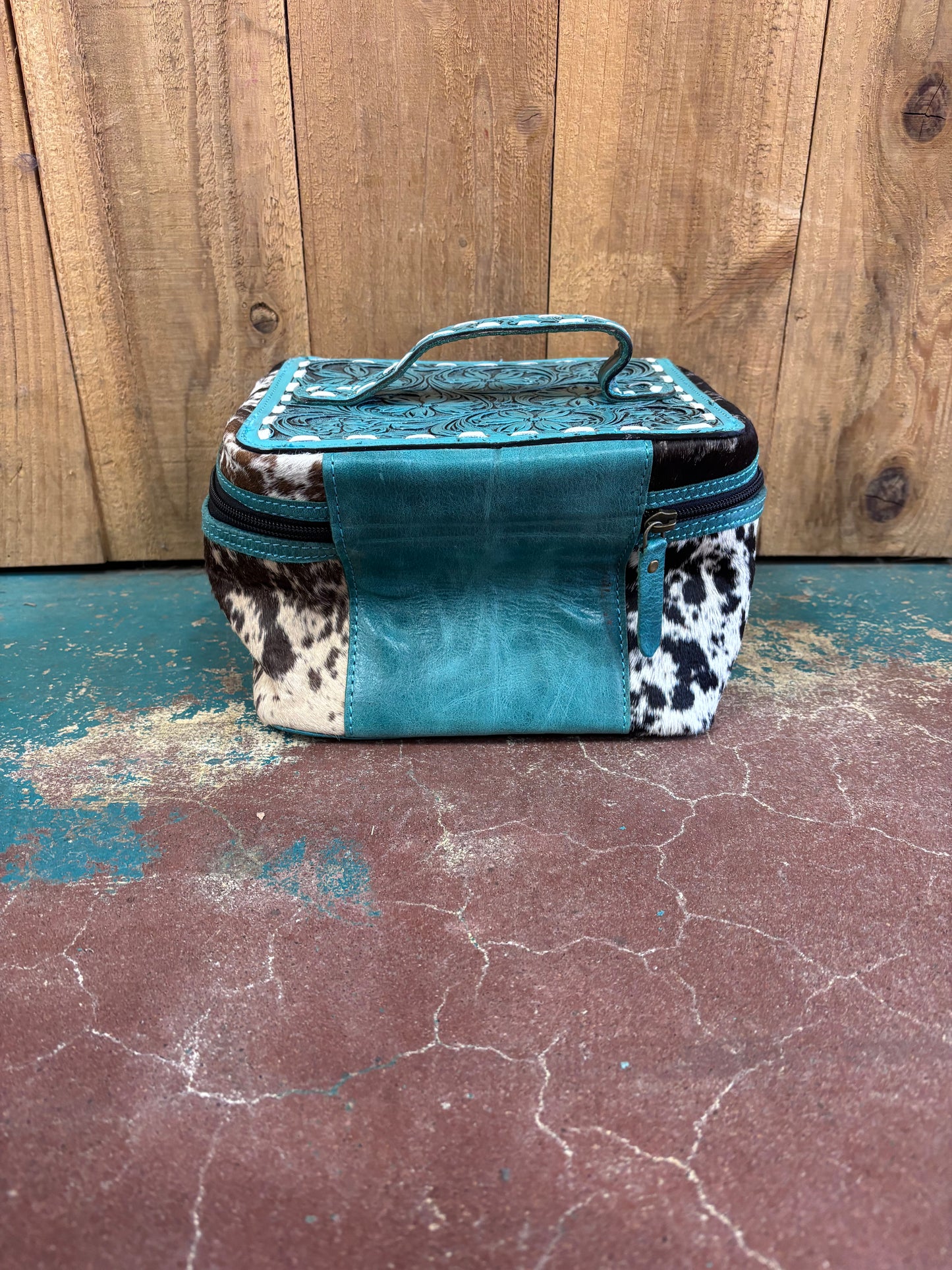 Turquoise Tooled Black And White Cowhide Leather Make Up Bag