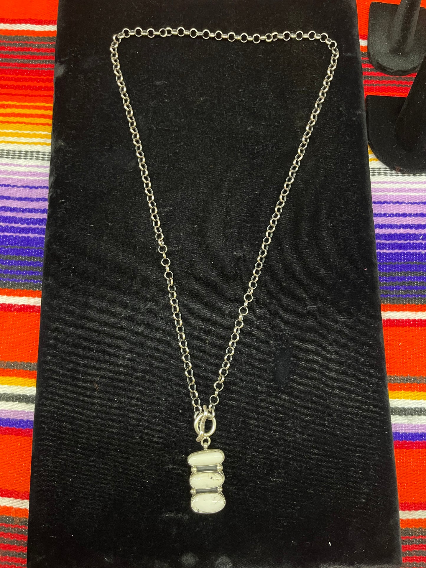 White Buffalo Lariat Necklace by Russell Sam, Navajo