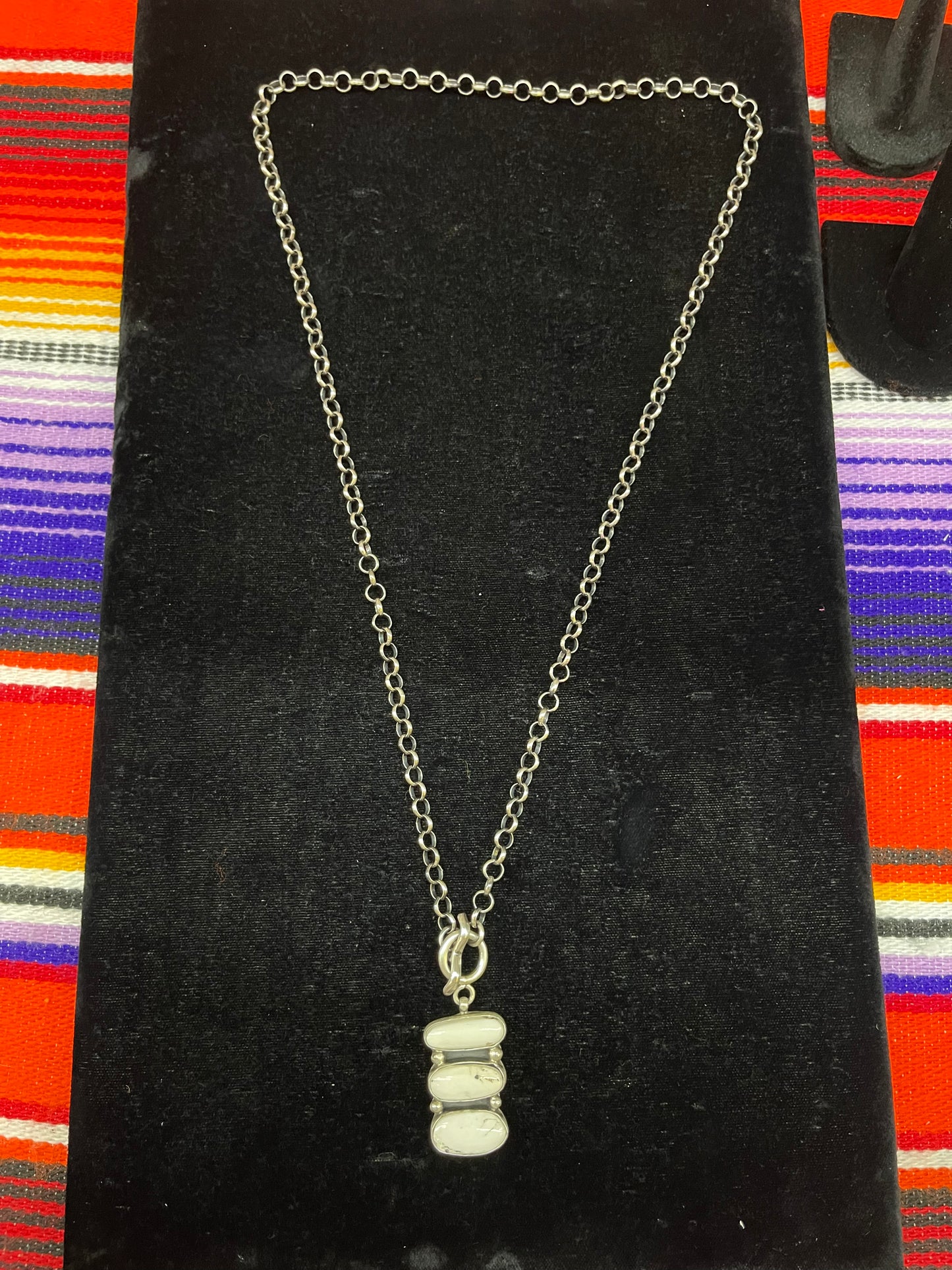 White Buffalo Lariat Necklace by Russell Sam, Navajo