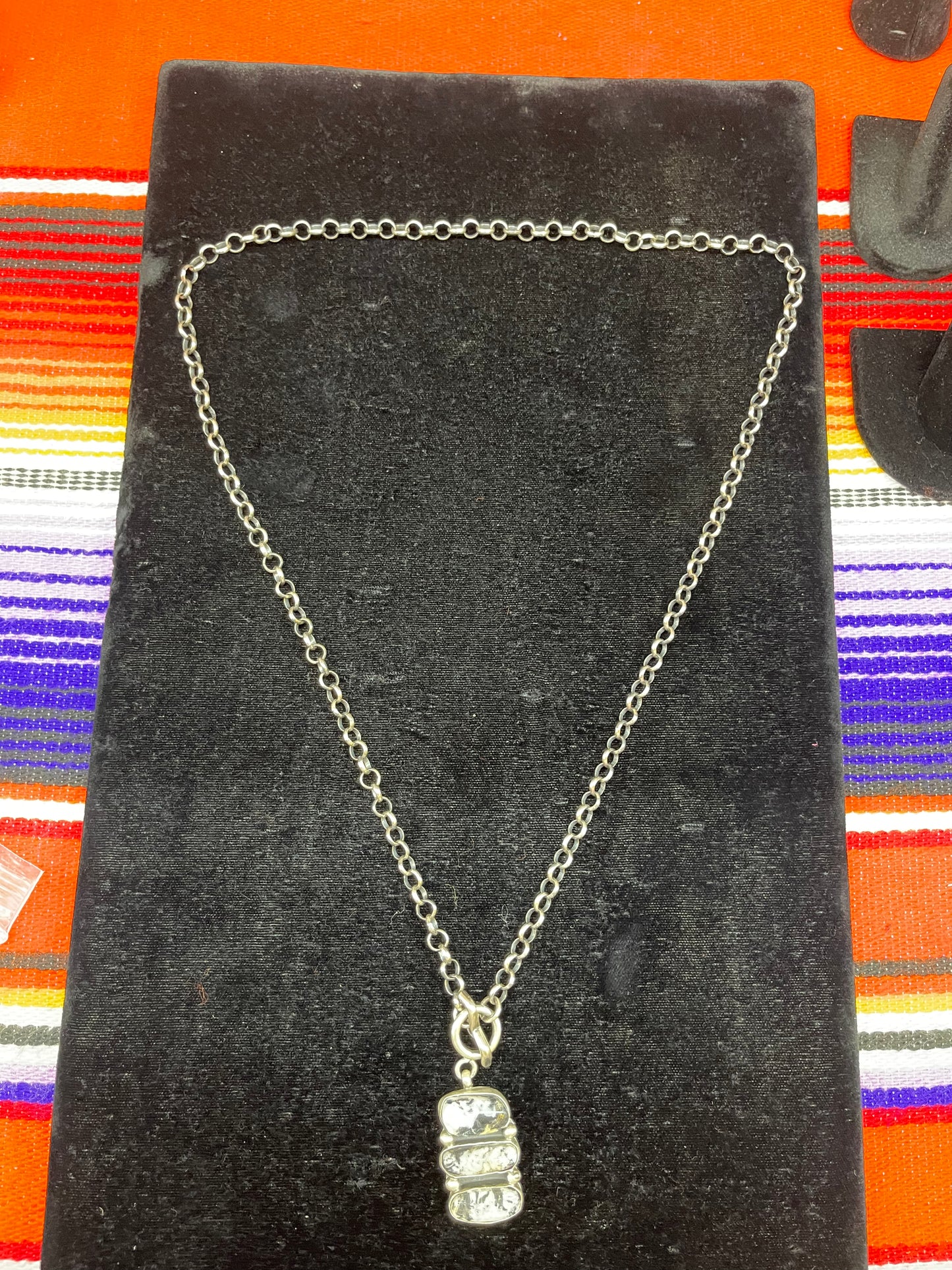 White Buffalo Lariat Necklace by Russell Sam, Navajo