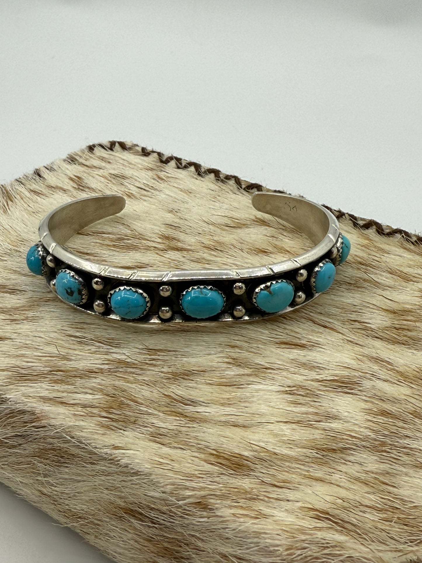 7" 7 Stone Turquoise Cuff by Reed Charley, Navajo