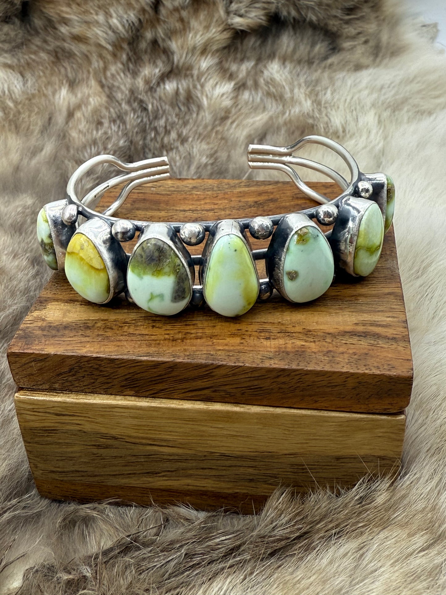 7 Stone Palomino Turquoise Cuff by Tom Lewis, Navajo