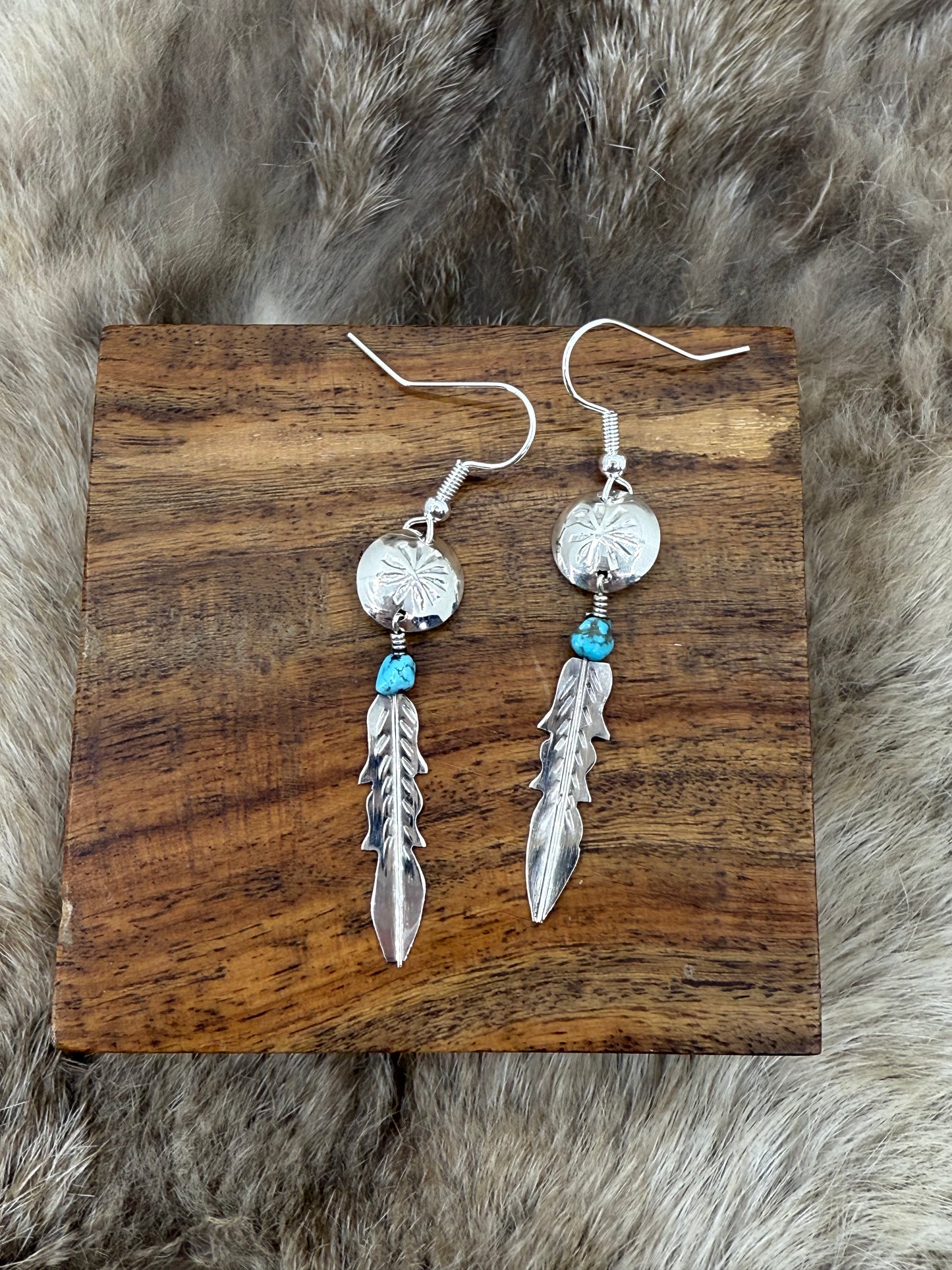 Stamped Concho with Feather Dangle Earrings by Vernon Tsosie, Navajo