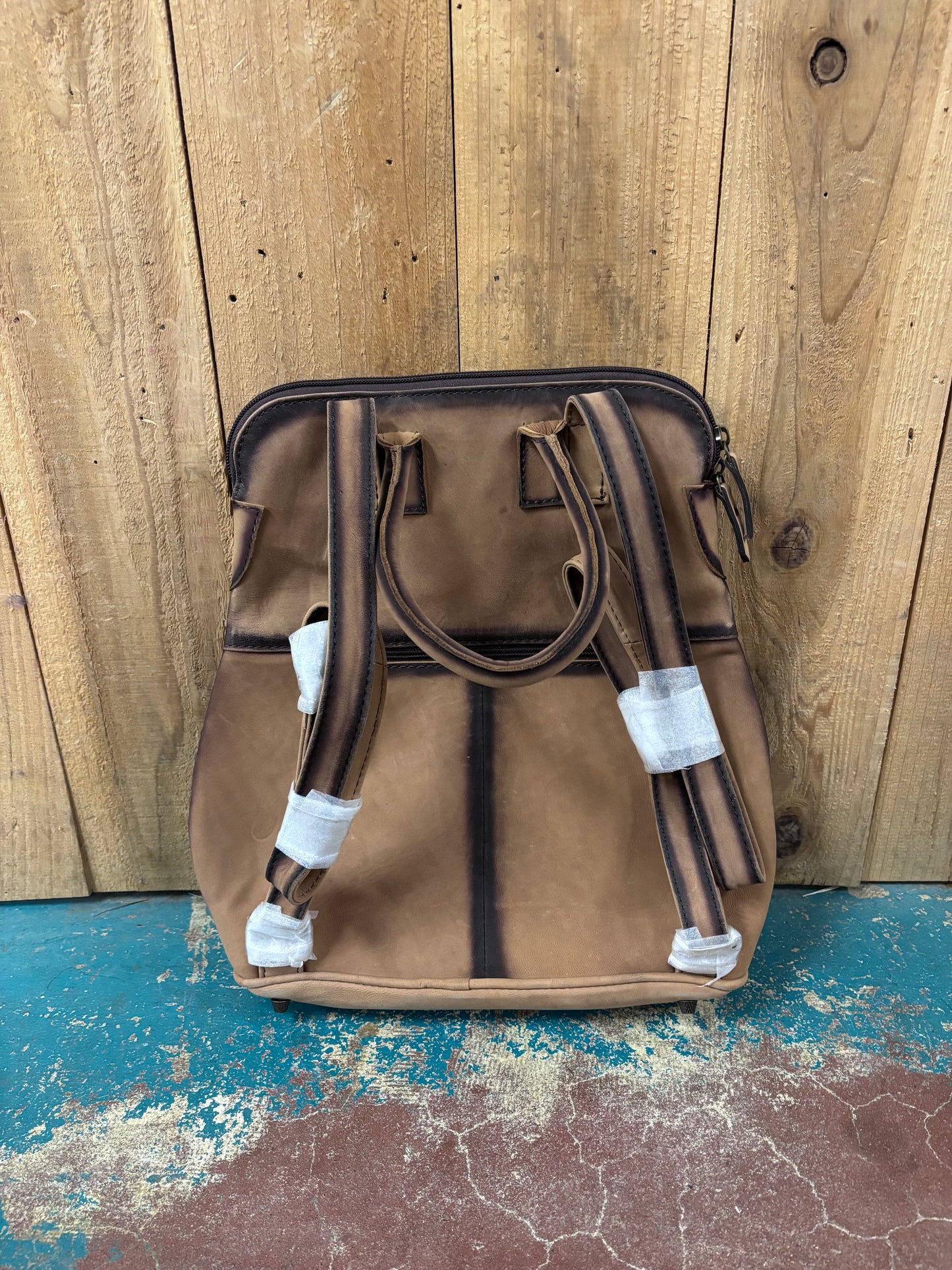 Small Brown Flower Tooled Buck Stitched Leather Backpack