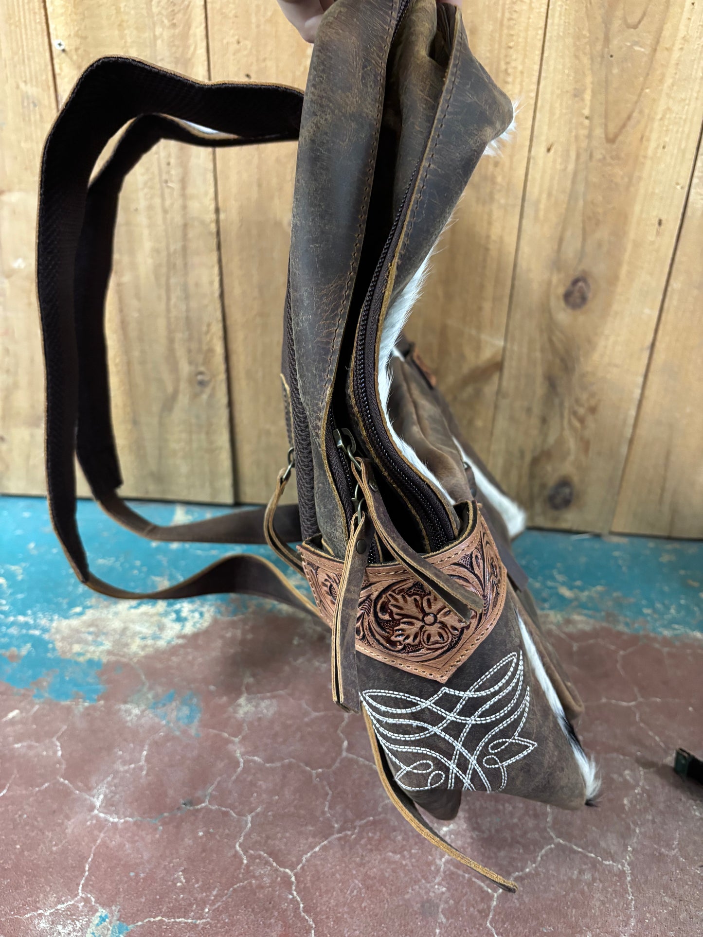 White And Black Cowhide Boot Stitched Leather Backpack