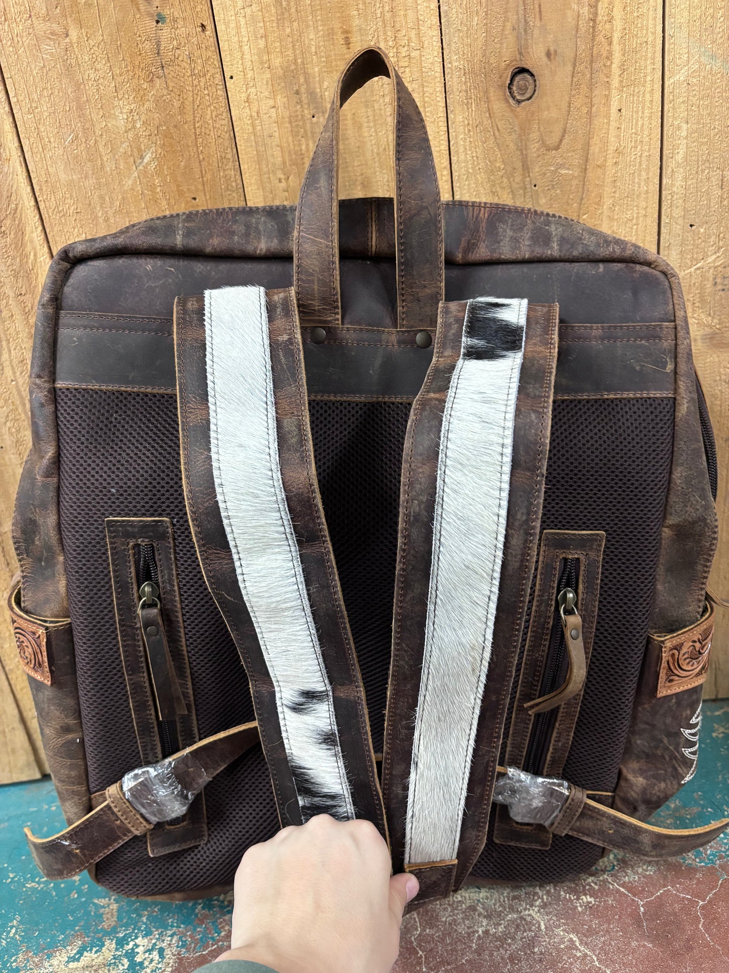 White And Black Cowhide Boot Stitched Leather Backpack