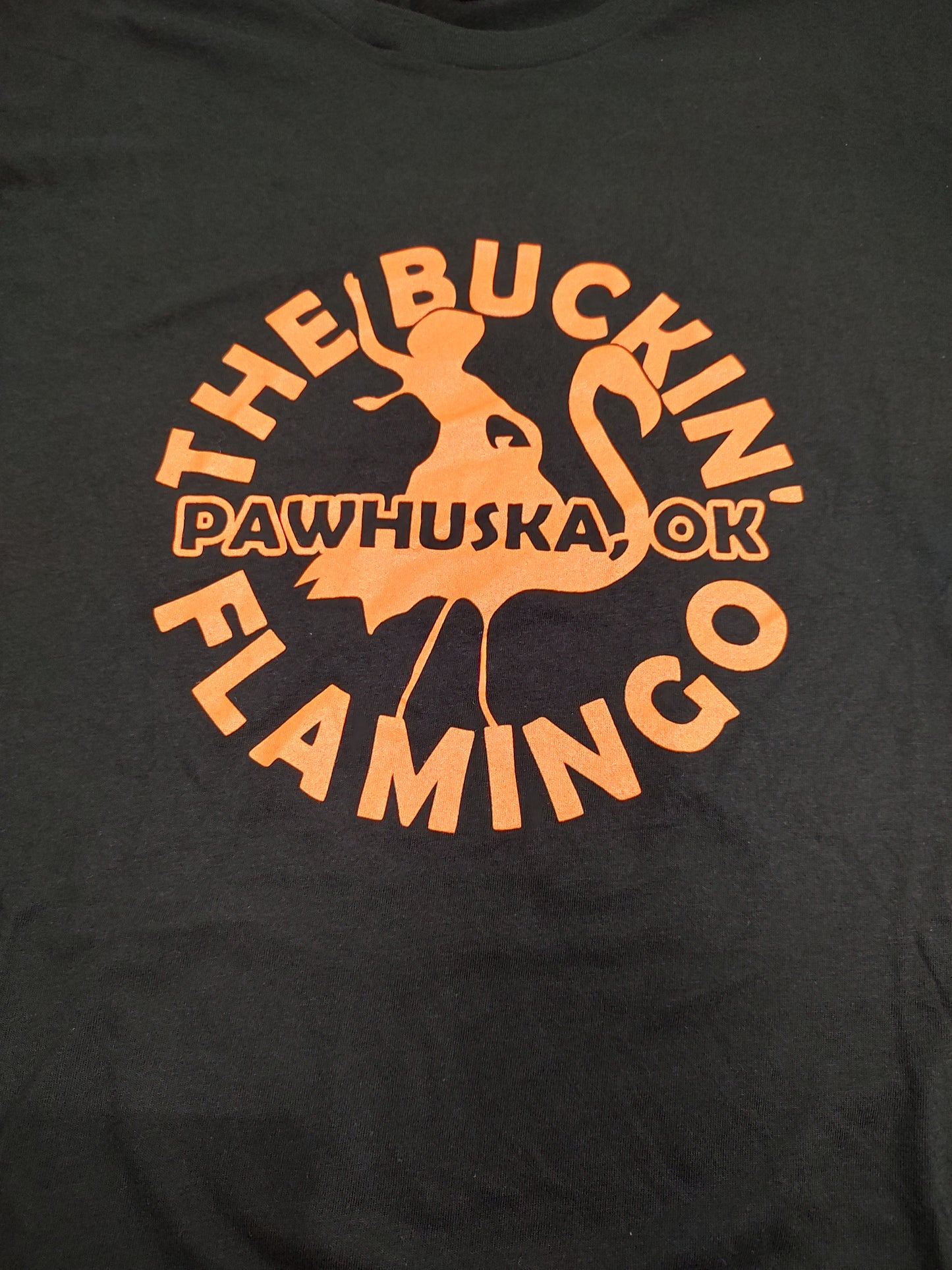 Orange Buckin' Flamingo Logo on a Black Shirt