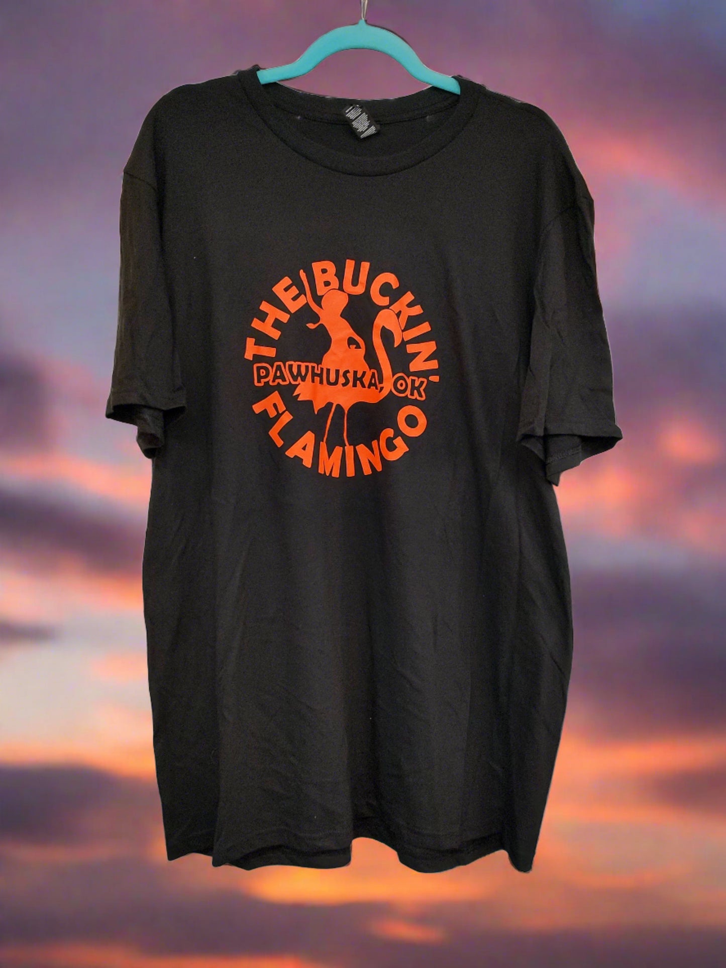 Orange Buckin' Flamingo Logo on a Black Shirt