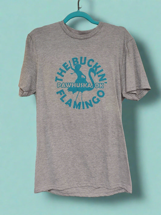 Turquoise Buckin' Flamingo Logo on a Grey Shirt