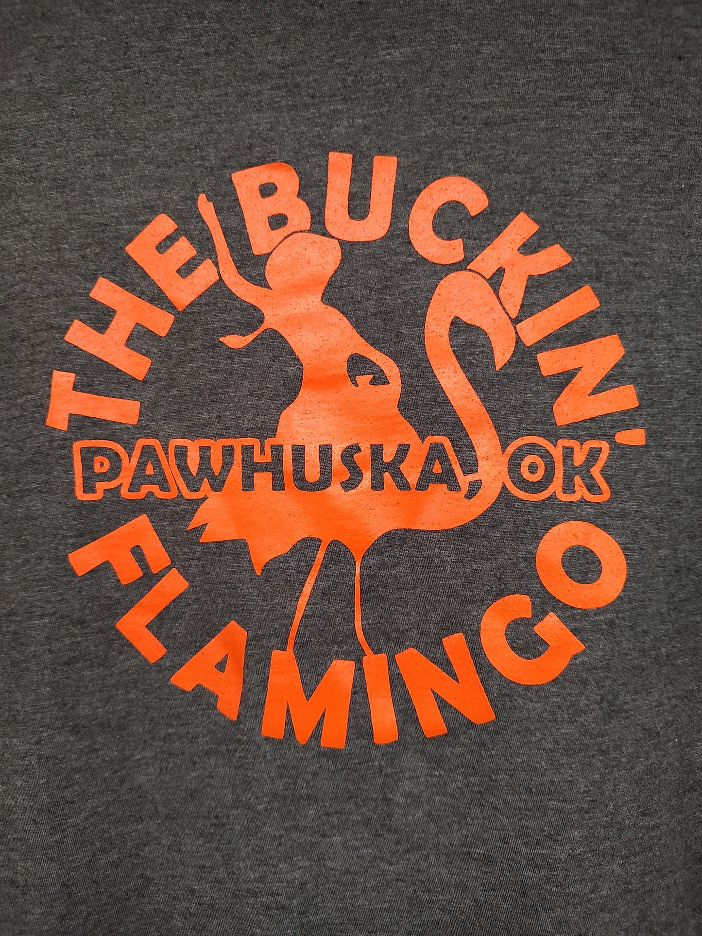 Orange Buckin' Flamingo Logo on a Grey/Black Shirt