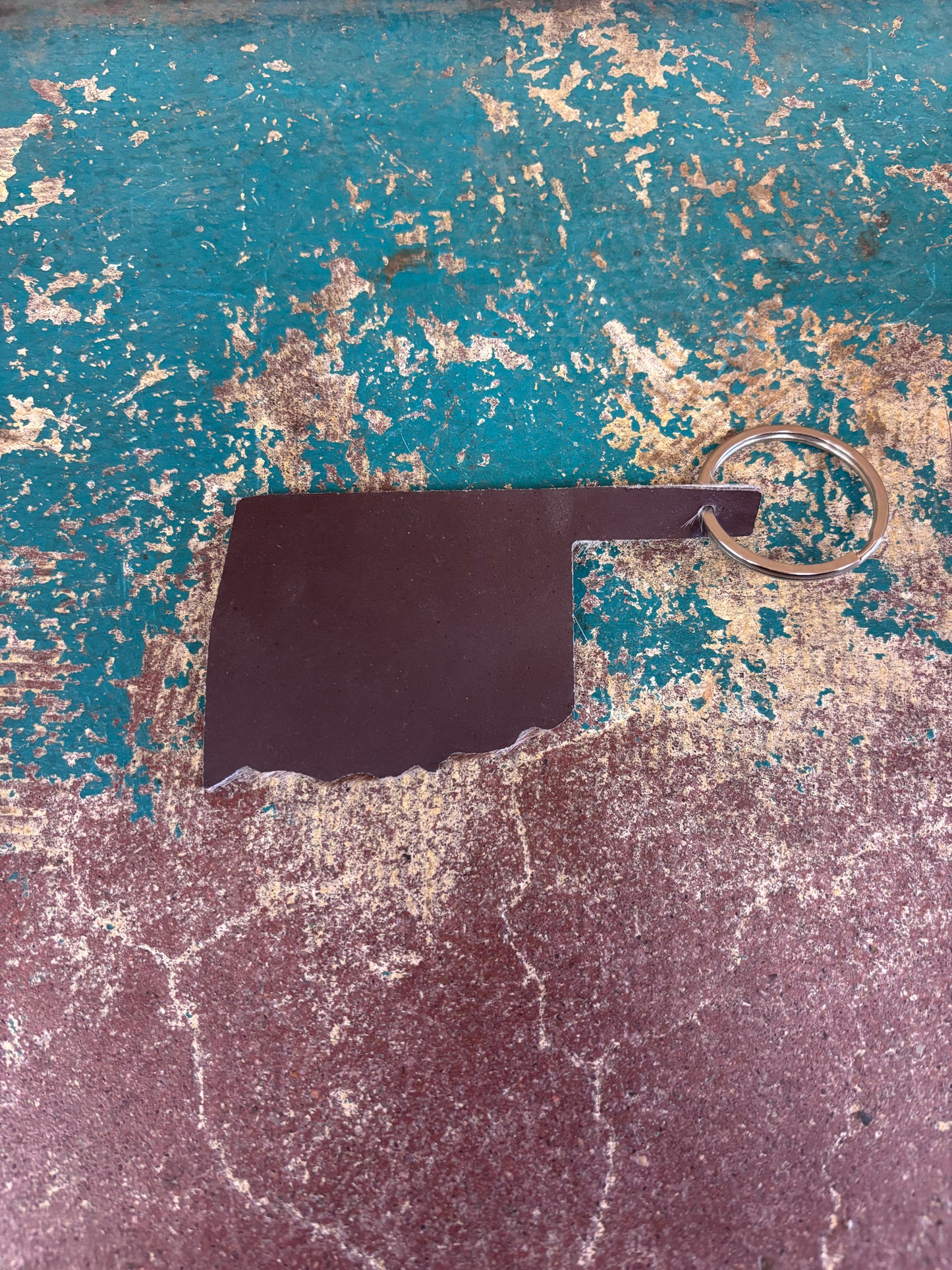 Brown And White Spotted Cowhide Oklahoma Keychain