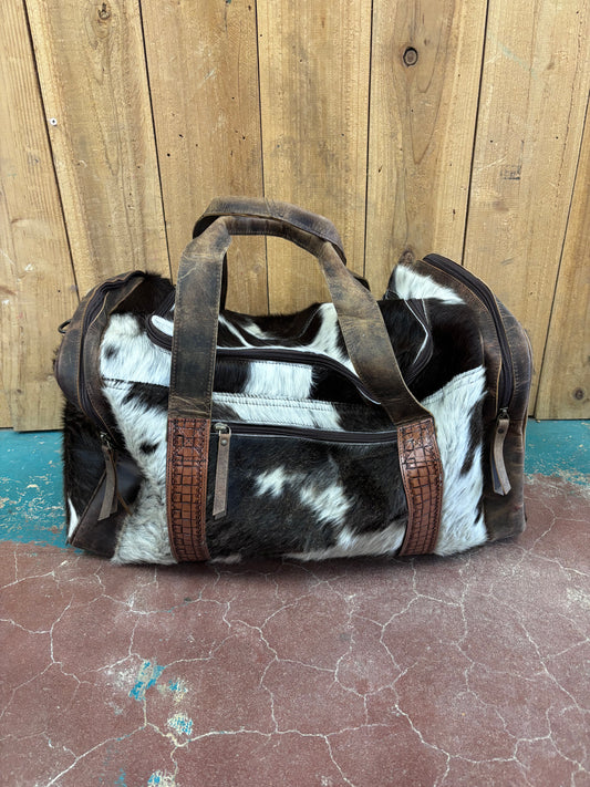 Brown And White Cowhide Duffle Bag