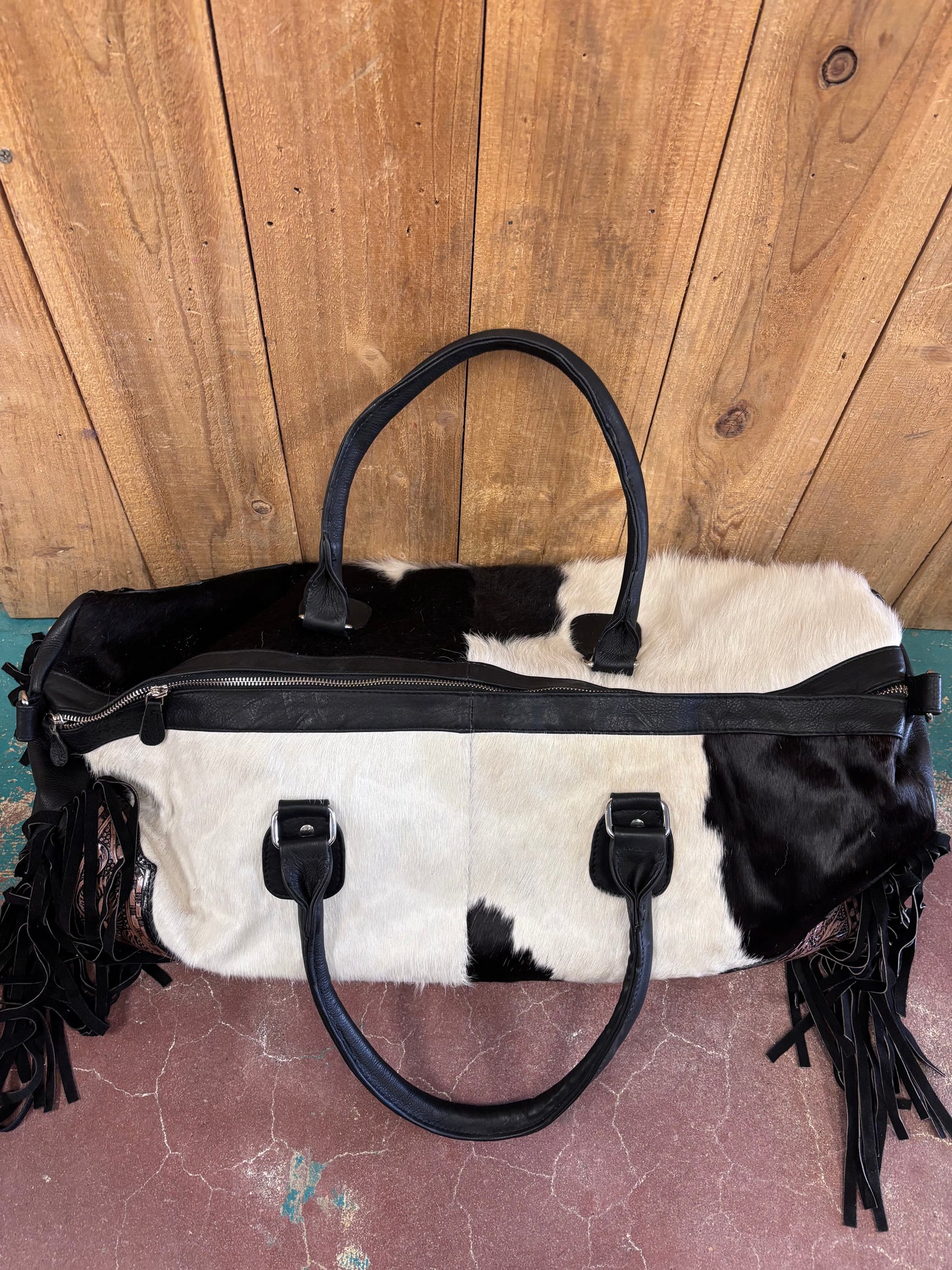 Black And White Cowhide Fringed Leather Duffle Bag