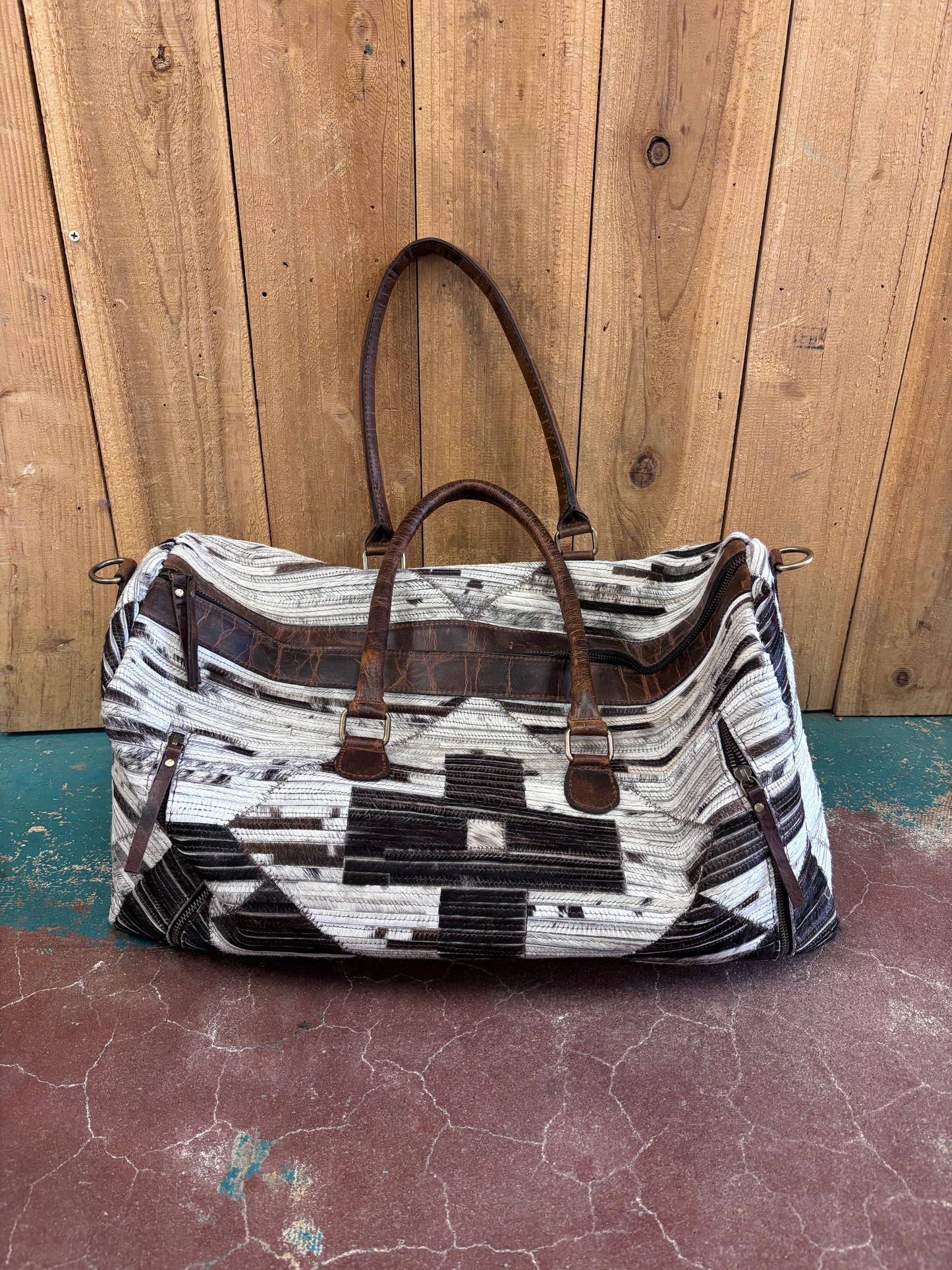 White and Black Cross Patterned Cowhide Duffle Bag