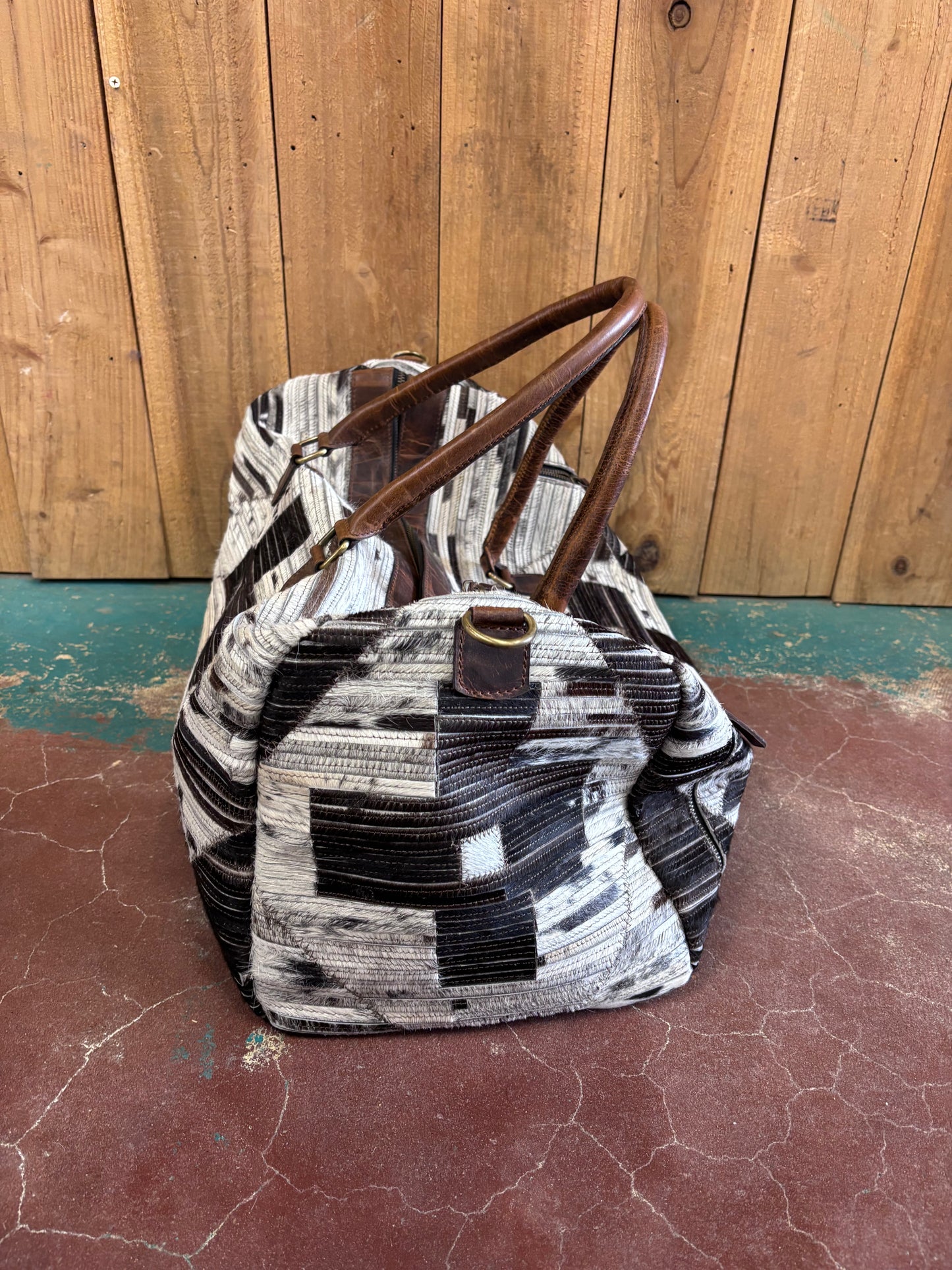 White and Black Cross Patterned Cowhide Duffle Bag