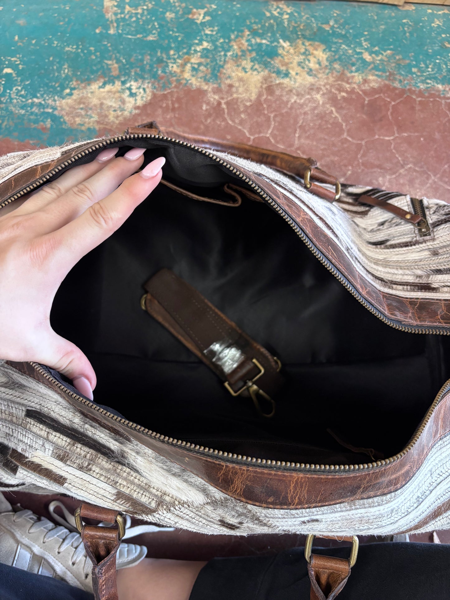 White and Black Cross Patterned Cowhide Duffle Bag