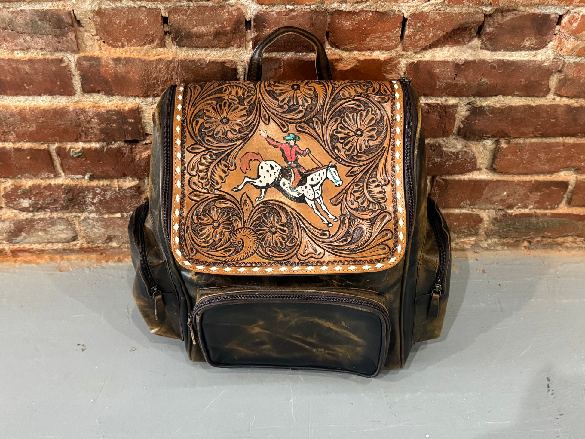 Bull Rider Backpack Handmade leather backpack with cowboy on horse – Buckin' Flamingo