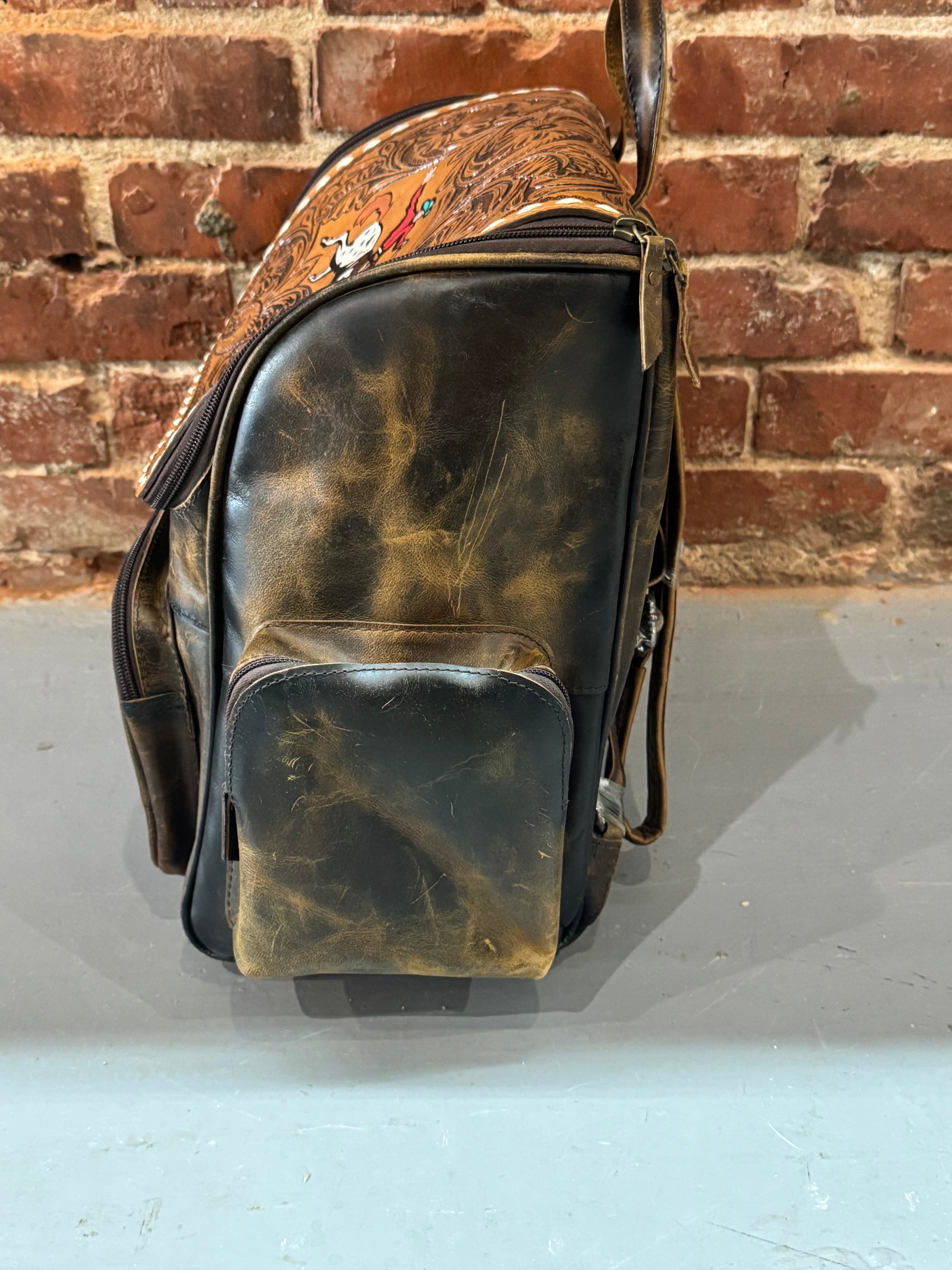 Bull Rider Backpack Handmade leather backpack with cowboy on horse – Buckin' Flamingo