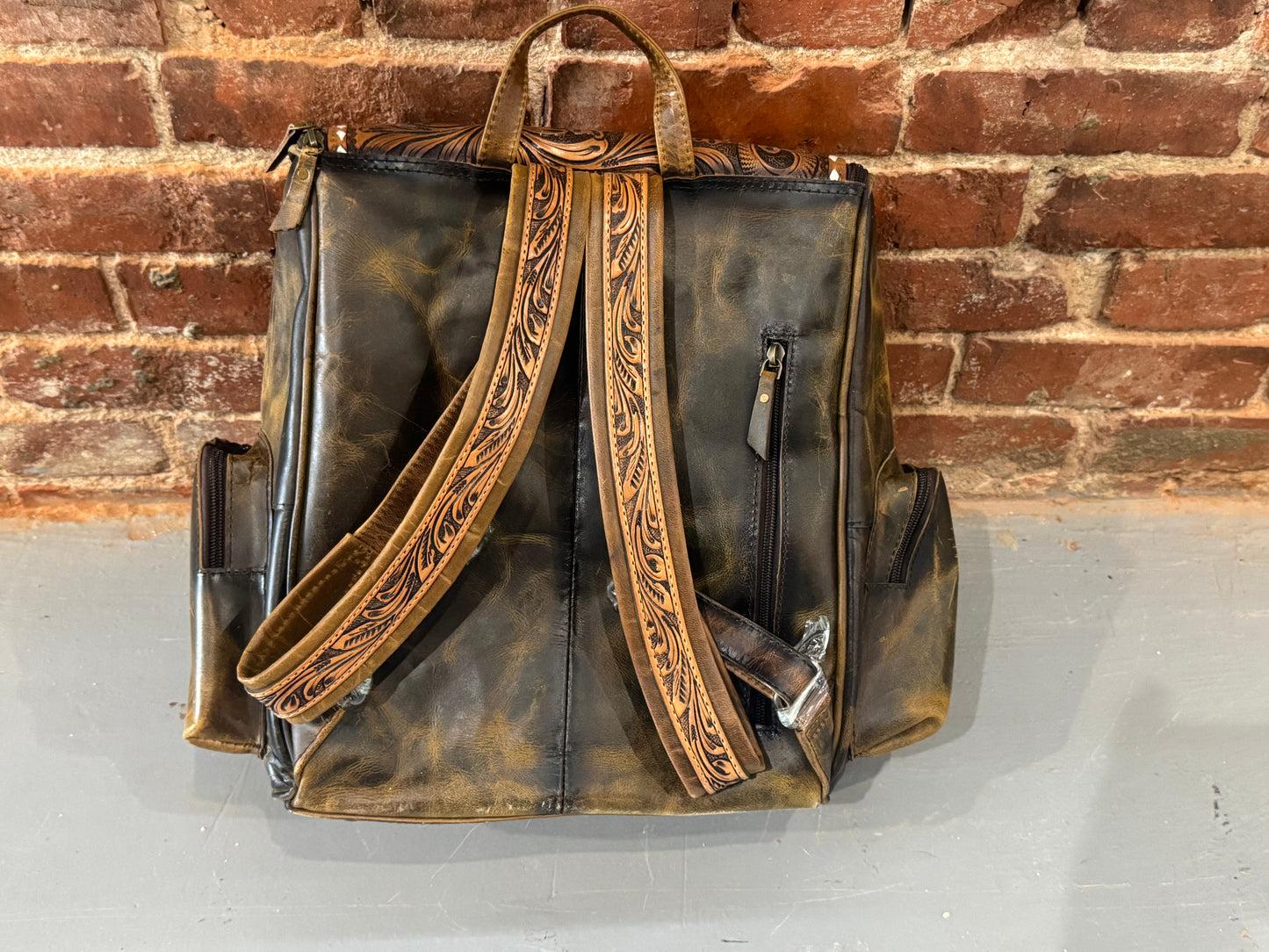 Handmade leather backpack with cowboy on horse