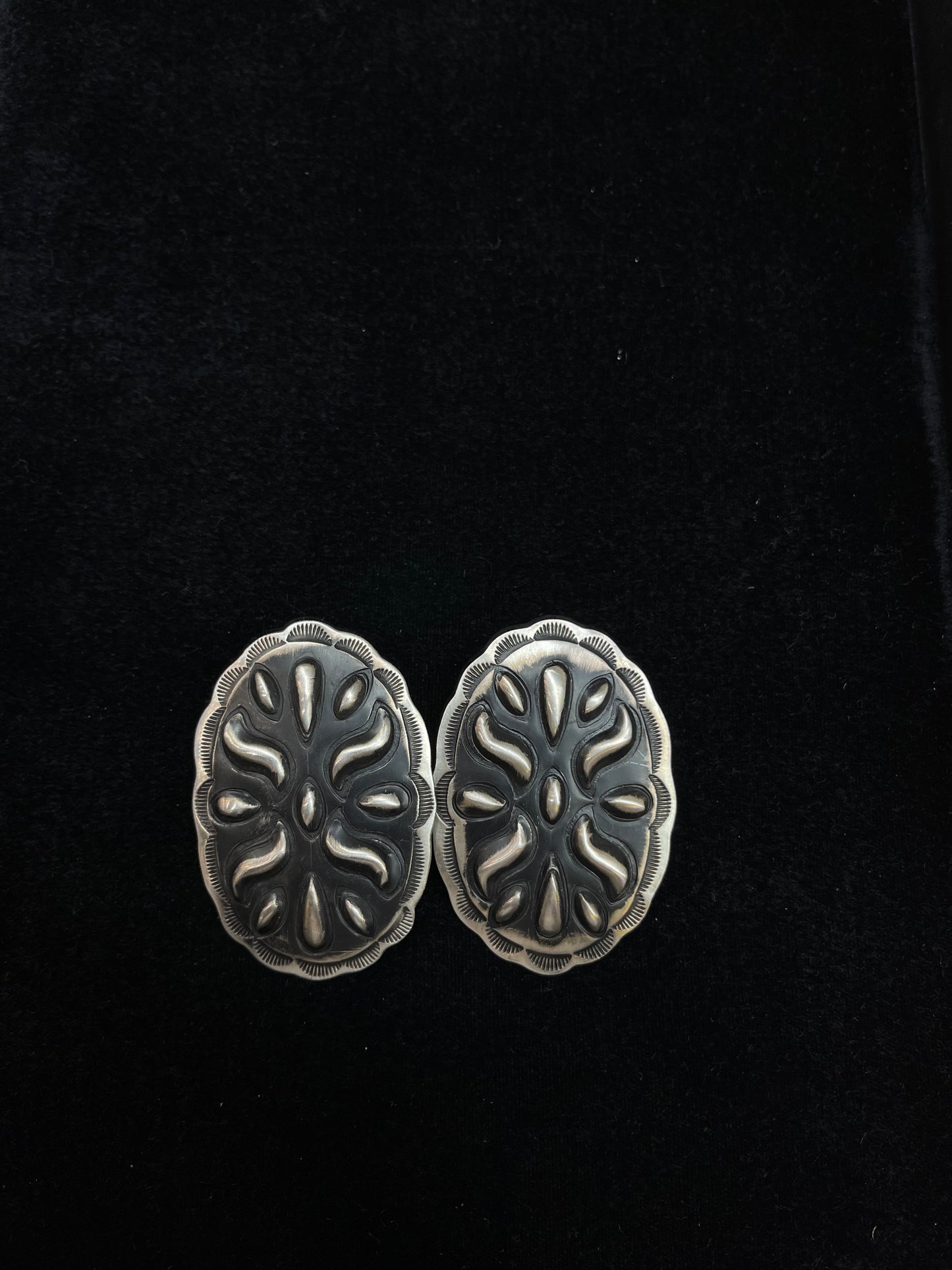 Big Concho Stamped Earrings by Leander Tahe, Navajo