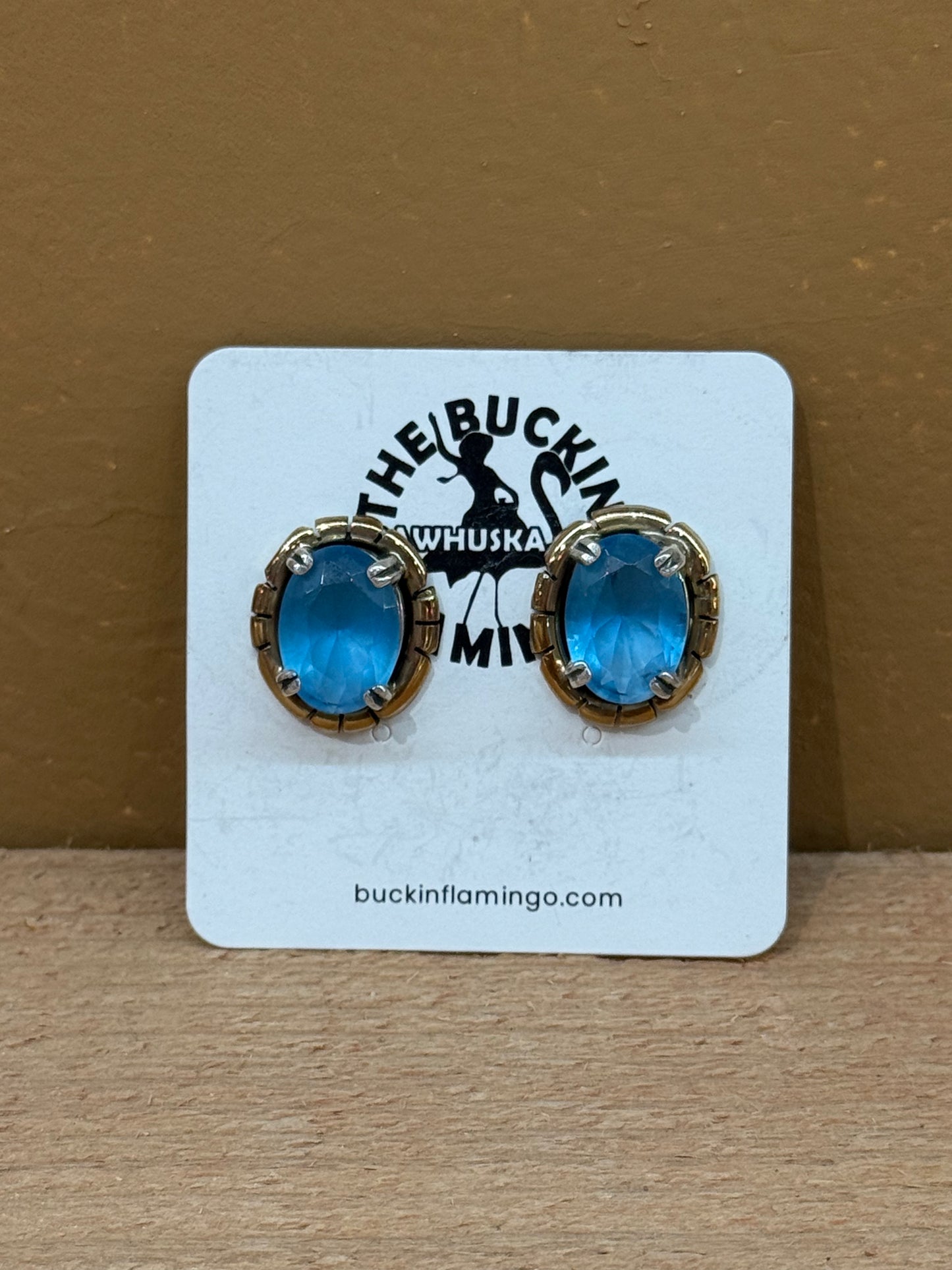 Blue Topaz in Sterling and Brass Setting by Russell Sam, Navajo