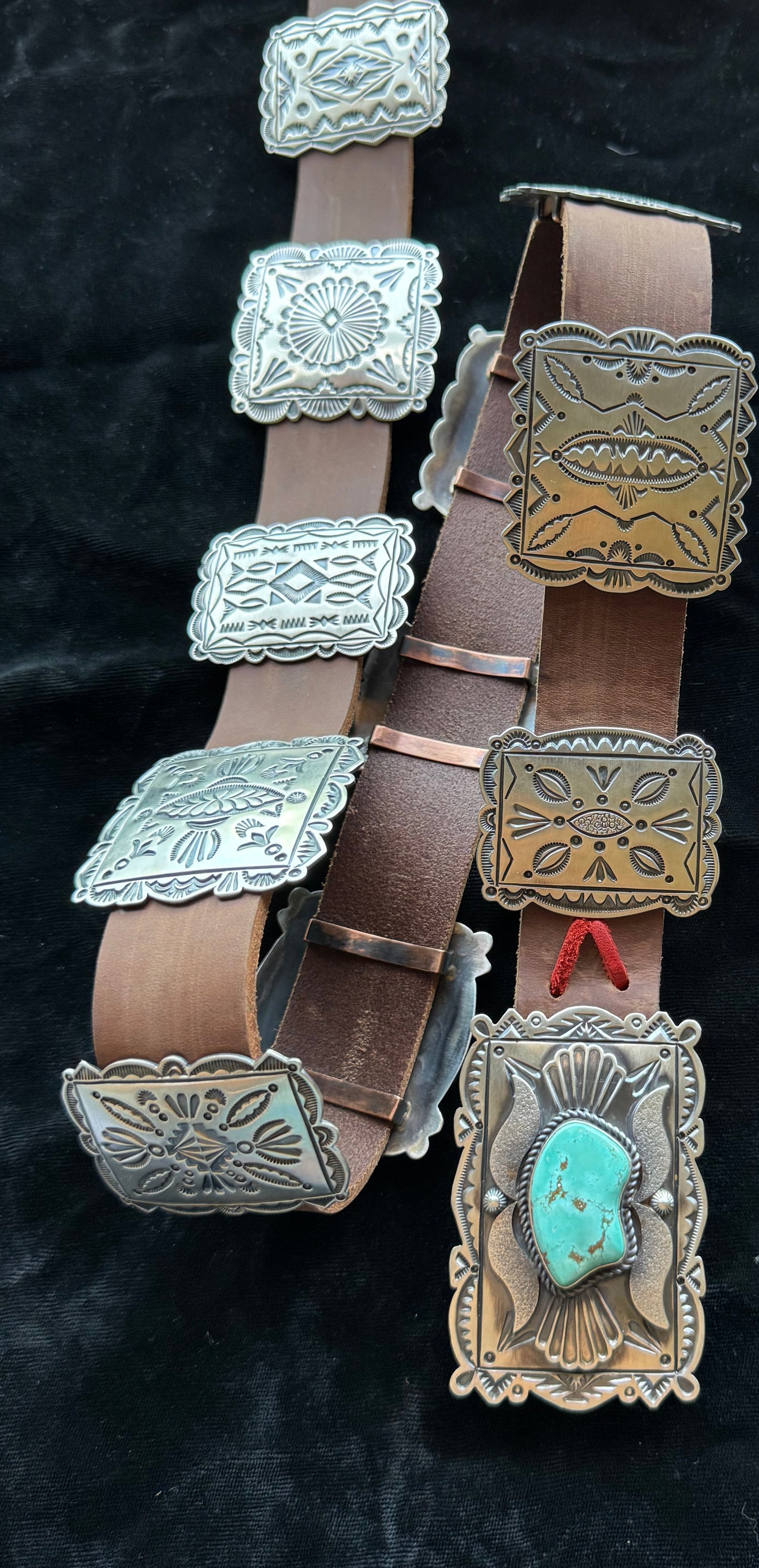 Turquoise bear belt with square conchos.