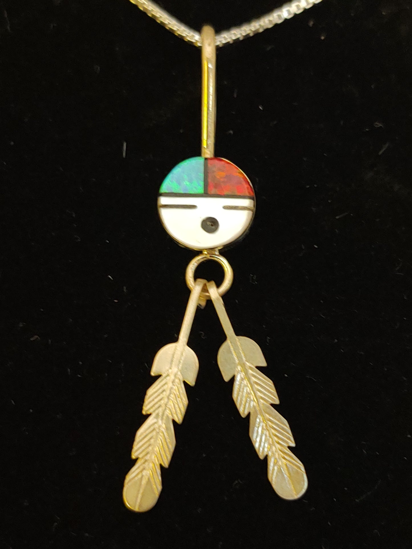 Mother of Pearl, Black Jet, Blue and Red Lab-Created Opal in Zuni Sun Face with Two Feathers on a 15 1/2 inch Necklace