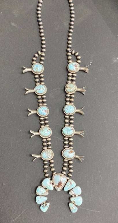 Golden hills turquoise Native American made squash blossom necklace by Damiah Cotten