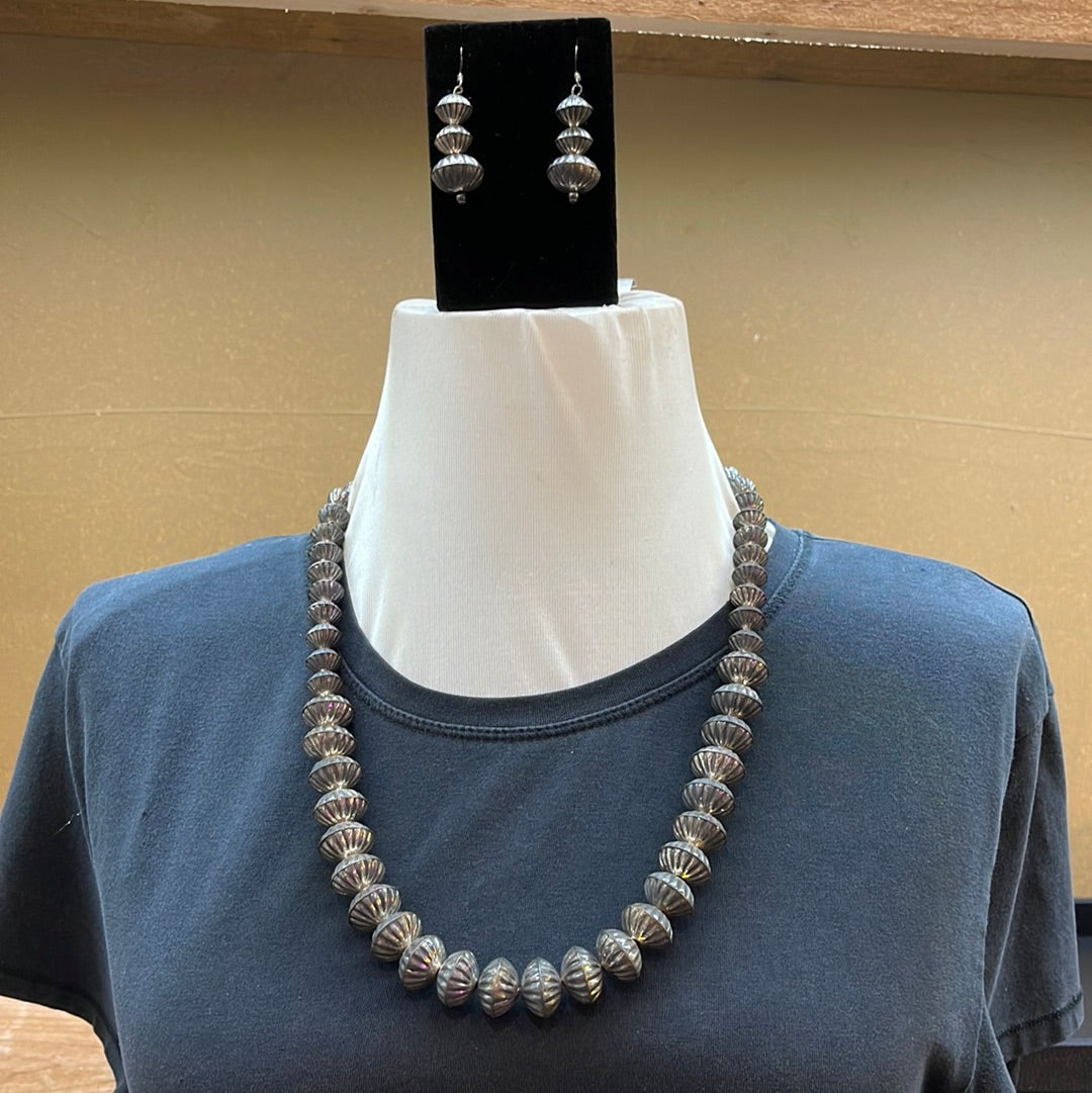 24”graduated silver pearl necklace and earring set
