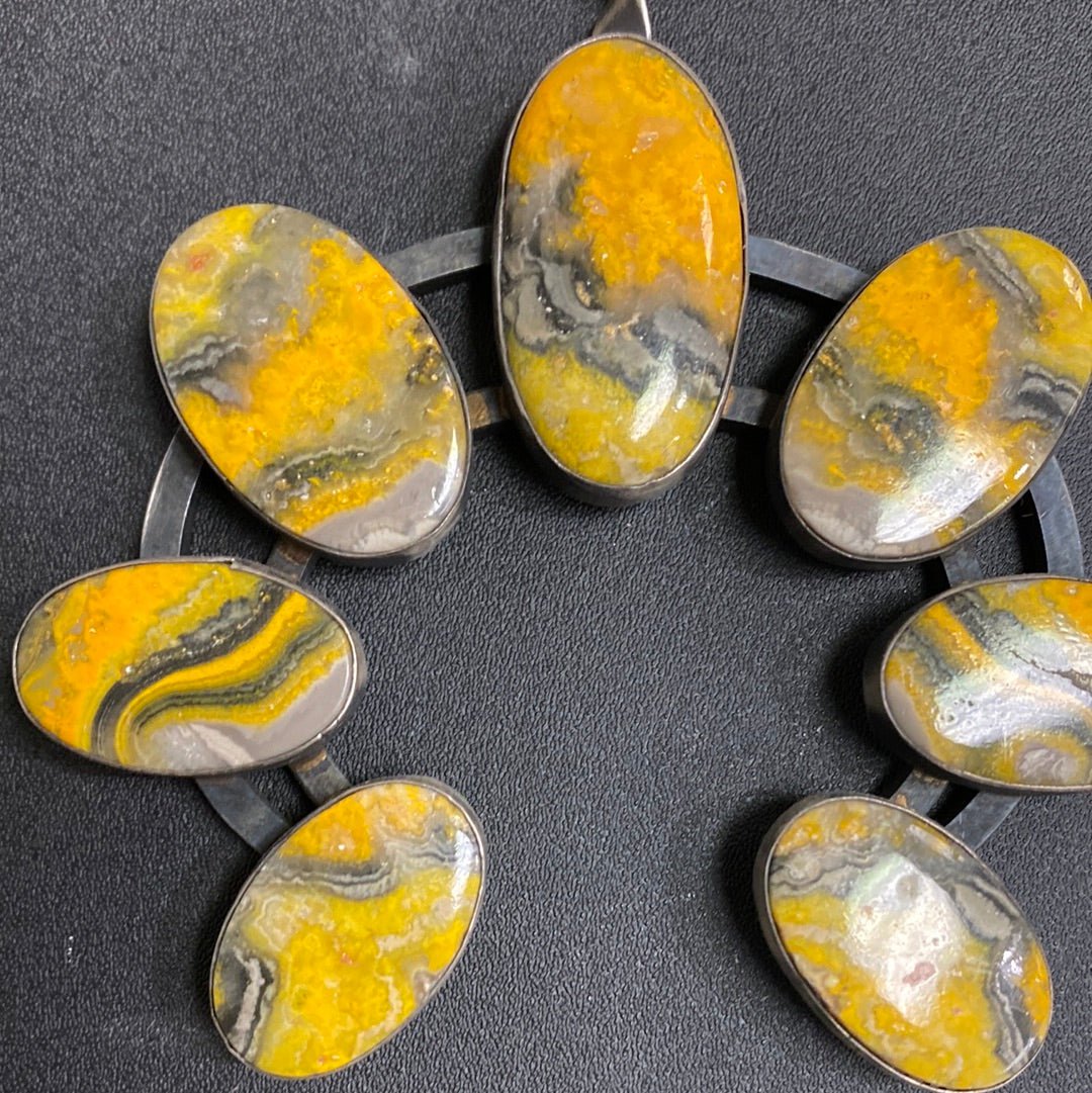 Native American made bumblebee jasper squash blossom by Chimney Butte